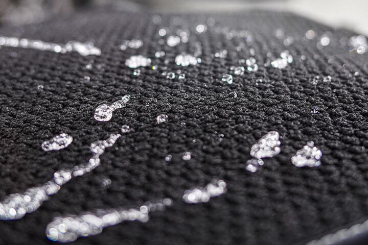rain drops on a car mat