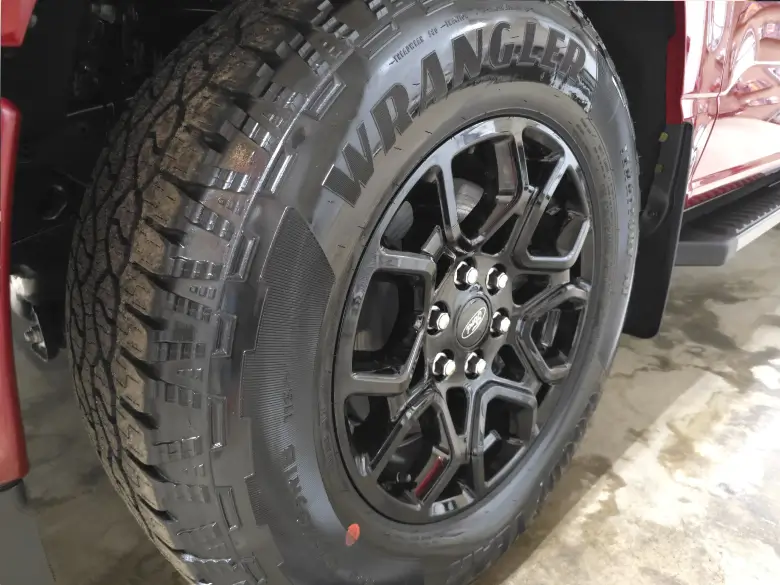 front of a black vehicle